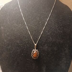 Elegant Silver and Amber Pendant Necklace